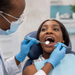 Patient receiving a dental examination at DentMind CBD Dental Centre, Nairobi CBD, with focus on gum health and cardiovascular risk