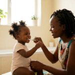 Parent brushing a toddler's teeth to prevent tooth decay in children.